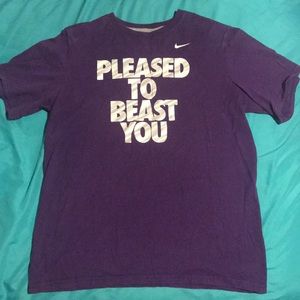 Purple Nike shirt